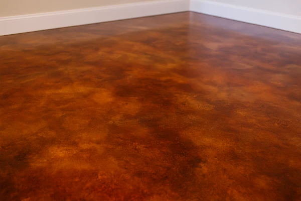a red epoxy floor from TMK Concrete Contractor in Leander, TX - Decorative Concrete